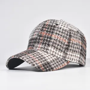 Detailed view of the autumn winter plaid baseball cap tweed fabric curved brim chic style