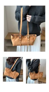 Braune Wildleder-Tasche für Damen, schicke Schultertasche mit Nieten und Doppelriemen.