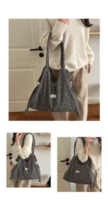 Vista detallada del bolso tote de pana gris con estampado de estrellas, bolso hombro.