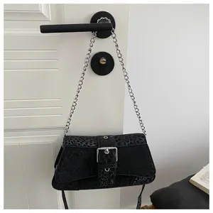 Trendy black stone pattern shoulder bag with metal chain strap and stylish front buckle detail.