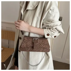 Chic brown leopard print shoulder bag with metal chain strap, trendy baguette bag for women.