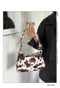 Borsa a spalla baguette stampa mucca retro borsa elegante da donna moda autunnale chic.