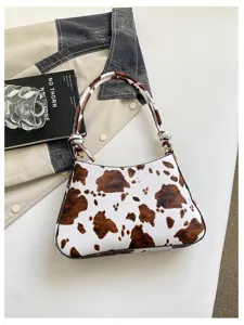 Elegante borsa a tracolla da donna con stampa mucca, borsa retro sottobraccio con cinturini nodati.