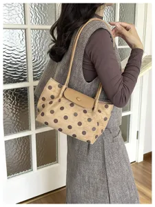 Chic khaki polka dot shoulder bag for women, elegant casual tote purse with flap closure.