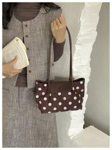 Brown polka dot shoulder bag, chic retro tote bag with long strap, stylish daily accessory.