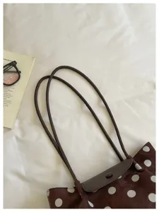 Chic polka dot canvas shoulder bag with elegant leather flap, trendy daily tote for women
