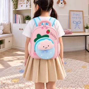 Detailed lifestyle view of the cute pink cartoon cloud kids school backpack worn on back.