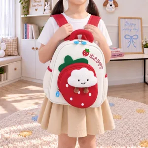 Detailed view of the kids strawberry plush cloud backpack, soft and cute design with side pockets.