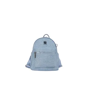 Light blue denim mini backpack detail view, featuring front zipper pocket and silver hardware.