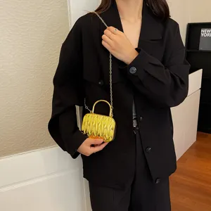 Golden metallic pleated box shoulder bag with chain strap and top handle for women daily fashion