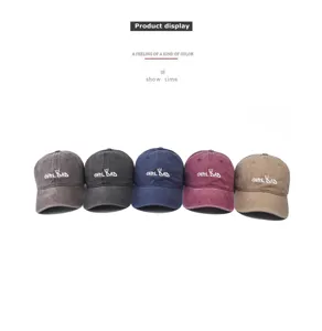 Vintage cotton baseball cap with crown embroidery, stylish unisex outdoor dad hat.