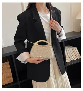 Elegant rhinestone evening bag with metal handle and chain strap for women banquets.