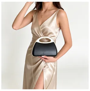 Elegant acrylic evening handbag with metal chain strap, chic hard shell design for women.