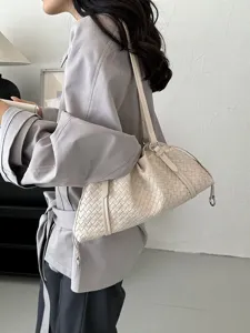 Sac à épaule tressé chic pour femme, élégant sac fourre-tout en cuir synthétique.