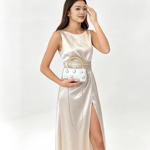 Chic metal evening clutch bag for women, featuring bamboo handle and chain strap for style.