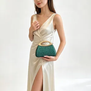 Elegant green glitter evening clutch bag with metal handle and chain strap for women.