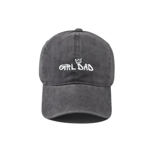 Washed cotton baseball cap detail showcasing the embroidered crown and GIRL DAD text design.