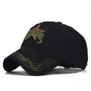 Close-up detail of black cotton baseball cap front star embroidery and curved brim stitching.