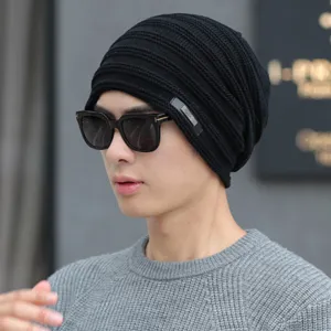 Bonnet d'hiver en tricot noir pour homme et femme, chapeau chaud doublé polaire pour outdoor.