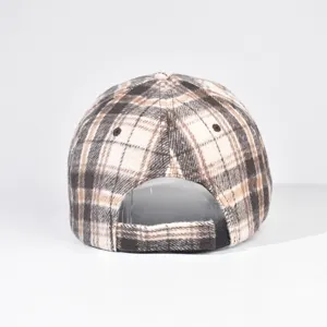Rear detail view of the winter plaid baseball cap showing adjustable strap and stitching quality.
