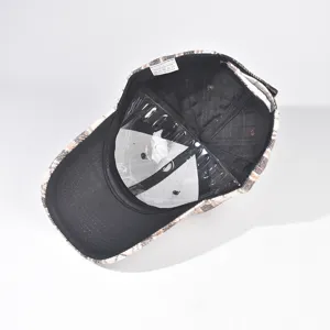 Detailed view of the winter plaid baseball cap interior showing cotton label and structure.