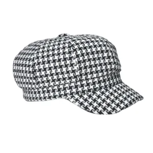 Classic black and white houndstooth newsboy cap, stylish octagonal beret for women.