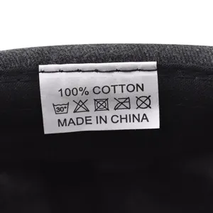 Product detail view showing the inner wash label of the washed cotton docker cap.