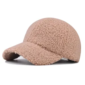 Beige teddy fleece baseball cap detail view, thick fuzzy winter warm hat for outdoor wear.