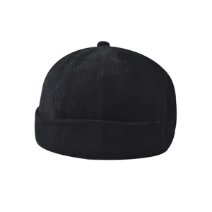 Black corduroy dockers cap detail, vintage brimless sailor hat texture close up view