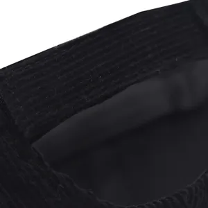 Close-up detail of black corduroy dockermer hat, soft texture, street style trendy headwear.