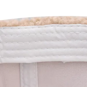 Detailed close-up view showing the soft inner lining and neat stitching of the lamb wool hat.