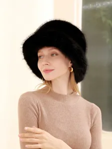 Black fox fur bucket hat for women, soft warm winter plush fisherman cap for outdoor wear.