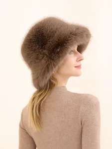 Detailed view of the cozy brown fluffy fur bucket hat, soft winter fashion accessory.