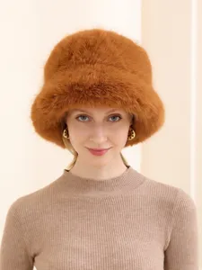 Stylish winter brown fur bucket hat, warm plush outdoor casual cap for women fashion.