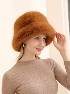 Winter warm faux fur bucket hat for women, trendy outdoor fashion furry fisherman style hat.