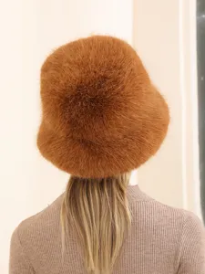 Detailed back view of a plush brown faux fur bucket hat, warm winter outdoor women fashion.