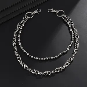 Gothic skull and bead double layer pants chain detail shot, perfect for edgy street style wear.