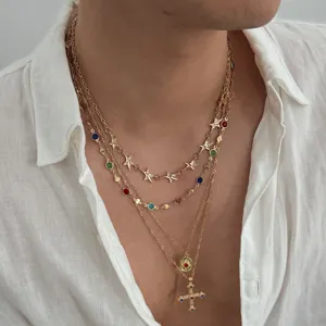 Ensemble de collier multi-couches pour homme avec chaîne étoilée et pendentif croix strass.