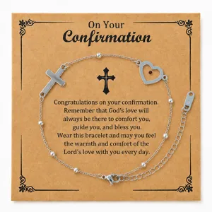 Bracelet en acier inoxydable avec pendentif croix coeur et carte de voeux de confirmation.