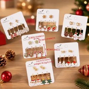 Ensemble de boucles d'oreilles émaillées de Noël avec bonhomme de neige et renne.