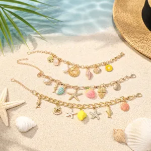 Summer beach ocean style charm bracelet set with cute starfish strawberry and seashell pendants.