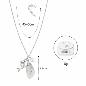 Ocean style dolphin sea glass pendant necklace with adjustable chain and weight detail 8g