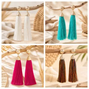 Bohemian long tassel earrings with geometric metal top, elegant vacation style drop earrings.