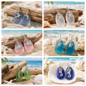 Handmade sea glass earrings featuring cute ocean charms for women summer beach style.