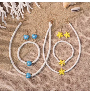Zomerse strandstijl kleikralen sieraden set met blauw boze oog hart en gele zeester hanger.