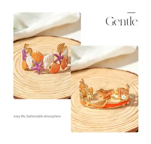 Ensemble de bracelet manchette émaillé étoile de mer coquillage et sirène style station balnéaire.