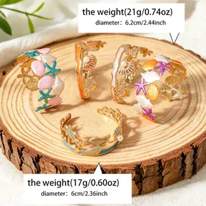 Ensemble de bracelets ouverts coquillage et étoile de mer, bijoux de plage d'été.