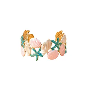 Bracelet manchette ouvert coquillage etoile de mer style vacances d'ete pour femme.