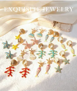 Pendientes tema océano con diseño de estrella de mar concha para estilo de vacaciones.