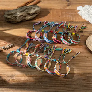 Handgemaakte geweven vriendschapsarmbanden kleurrijke regenboog kwast verstelbare sieraden